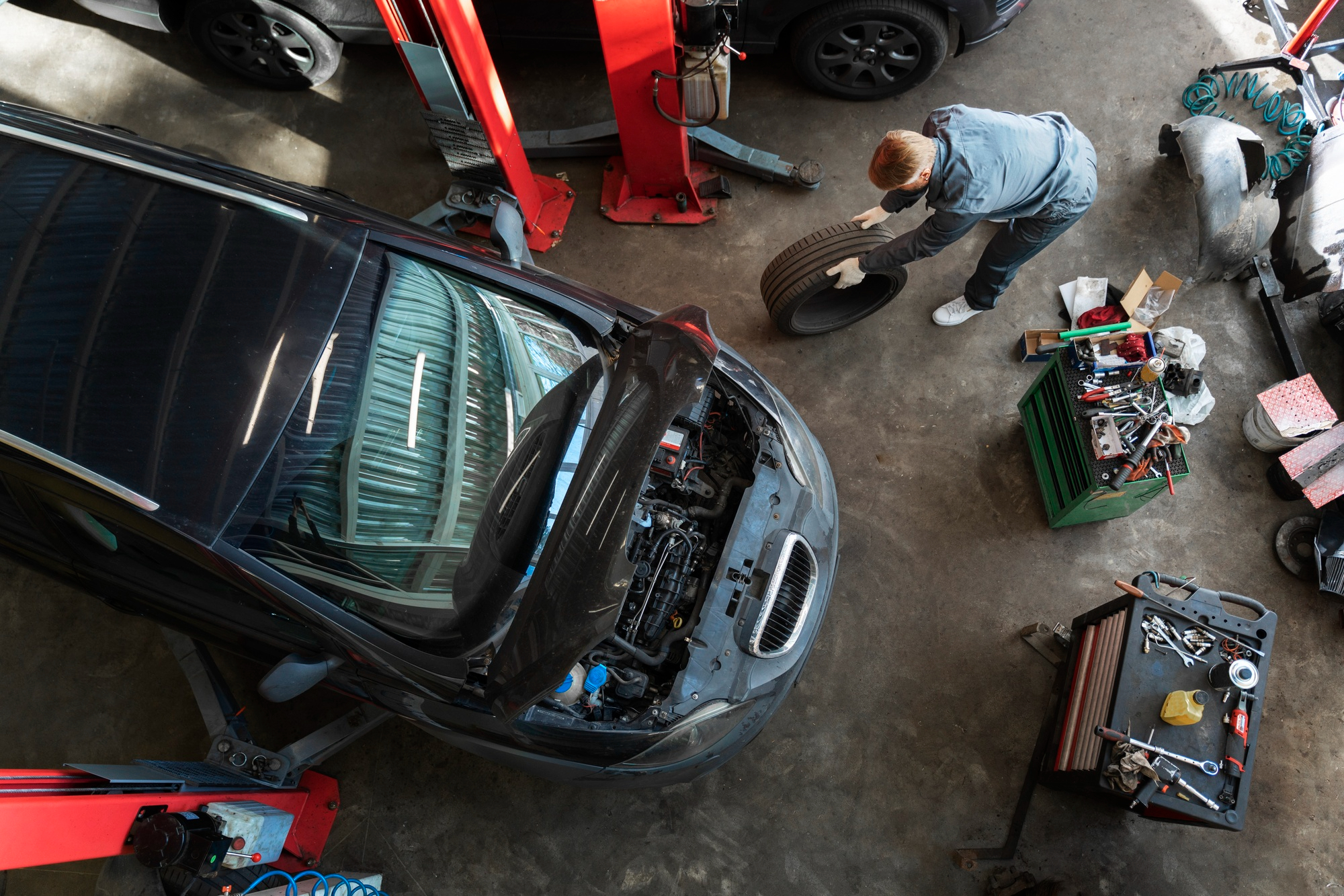 Mechanic performing car servicing in Kirrawee at Cronulla Sutherland Automatics